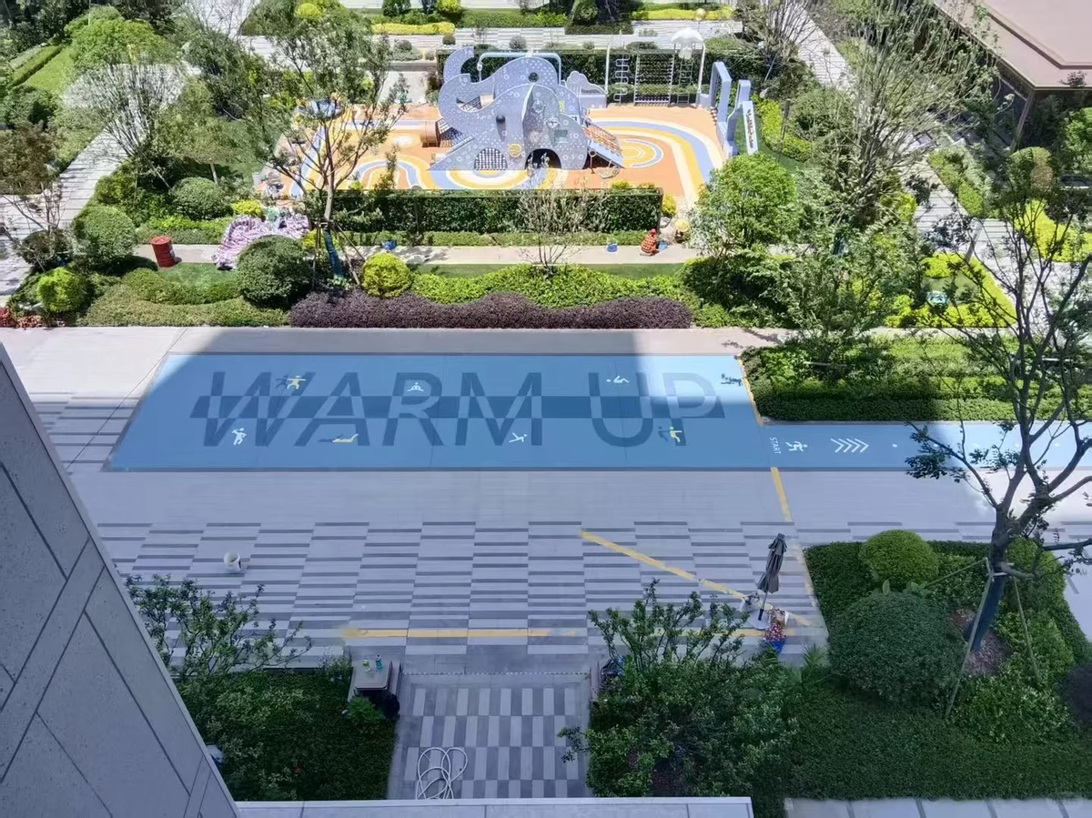 Why Are Modern Spaces Replacing Gray Pavement With Color? The Future of Smart Surface Design